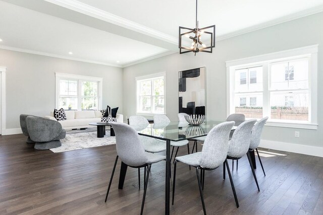 dining room with crown molding, an inviting chandelier, dark wood finished floors, recessed lighting, and baseboards