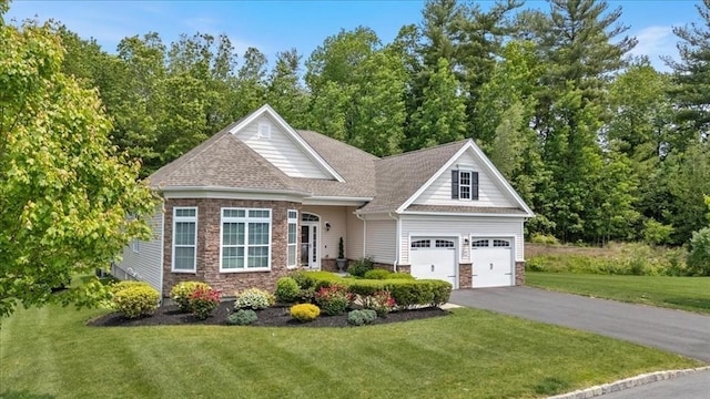 10 Sierra Ct Unit 10, Methuen, MA 01844 - view of front of house featuring stone siding, driveway, a front lawn, a shingled roof, and an attached garage