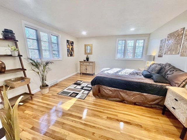 17 Brentwood Rd, Sudbury, MA 01776 - bedroom with wood finished floors, baseboards, multiple windows, and recessed lighting