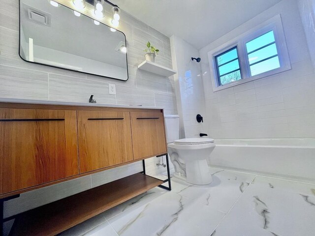17 Brentwood Rd, Sudbury, MA 01776 - bathroom with vanity, shower / bath combination, toilet, visible vents, and marble finish floor