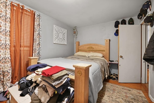 bedroom featuring hardwood / wood-style floors