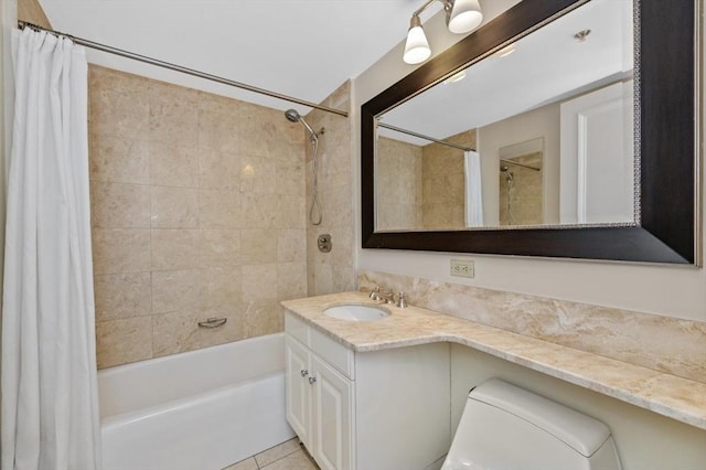 full bathroom featuring tile patterned floors, vanity, and shower / tub combo with curtain