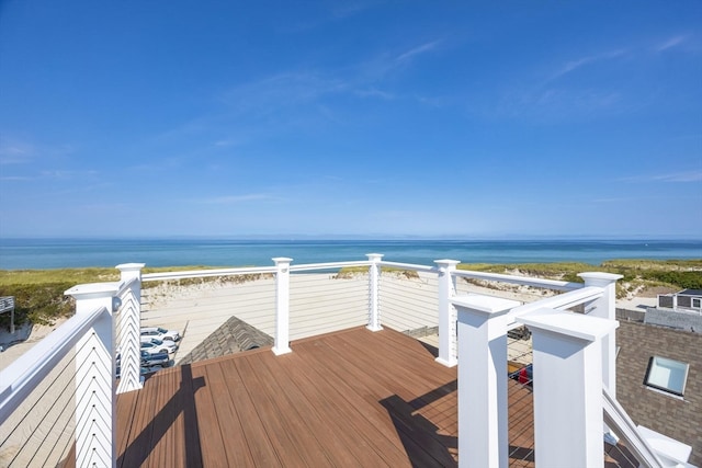 wooden terrace with a water view