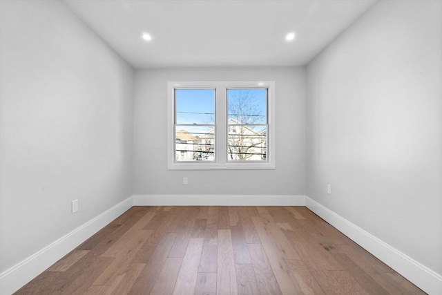 39 Bonner Ave Unit 39, Medford, MA 02155 - spare room featuring wood finished floors, recessed lighting, and baseboards