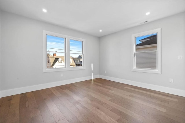 39 Bonner Ave Unit 39, Medford, MA 02155 - spare room featuring wood finished floors, baseboards, and recessed lighting