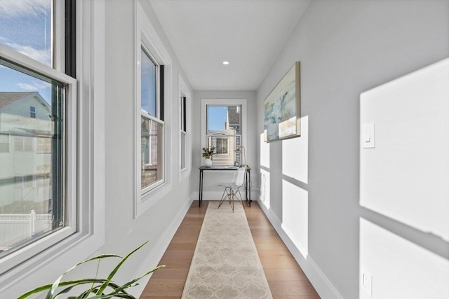 39 Bonner Ave Unit 39, Medford, MA 02155 - hallway featuring wood finished floors, baseboards, and recessed lighting