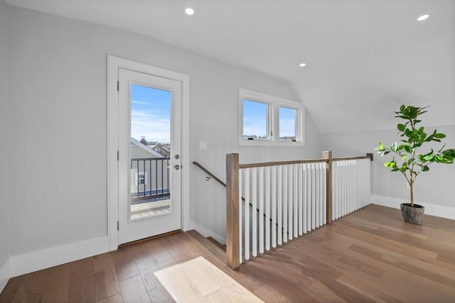 39 Bonner Ave Unit 39, Medford, MA 02155 - hall featuring hardwood / wood-style flooring, an upstairs landing, lofted ceiling, recessed lighting, and baseboards