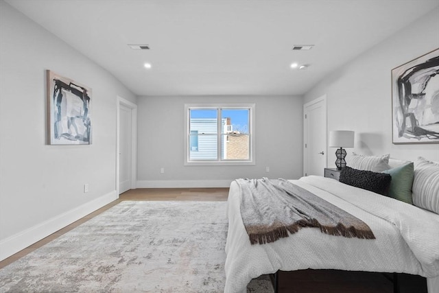 39 Bonner Ave Unit 39, Medford, MA 02155 - bedroom with baseboards, light wood-style floors, and recessed lighting