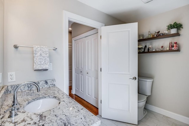 637 Gifford St Unit 4A, Falmouth, MA 02540 - bathroom with vanity and a closet