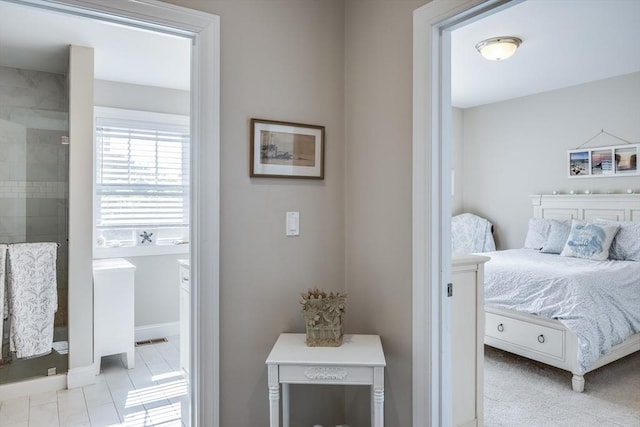 637 Gifford St Unit 4A, Falmouth, MA 02540 - bedroom with ensuite bathroom and baseboards