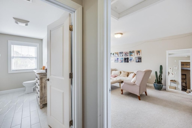 637 Gifford St Unit 4A, Falmouth, MA 02540 - hallway with baseboards and light carpet