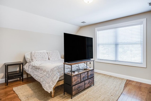 637 Gifford St Unit 4A, Falmouth, MA 02540 - bedroom with wood finished floors and lofted ceiling