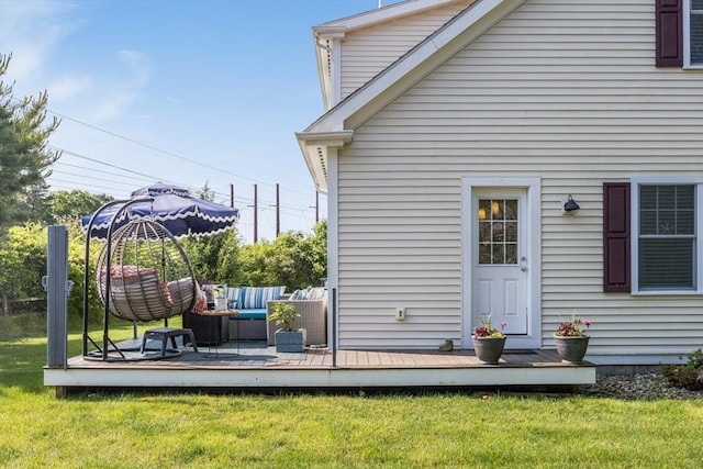 637 Gifford St Unit 4A, Falmouth, MA 02540 - back of house featuring outdoor lounge area, a wooden deck, and a lawn