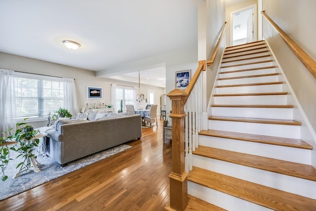 637 Gifford St Unit 4A, Falmouth, MA 02540 - stairs featuring hardwood / wood-style floors