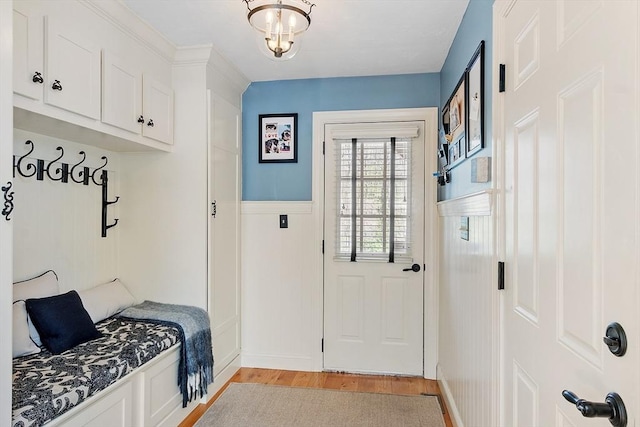 mudroom with light wood-style floors
