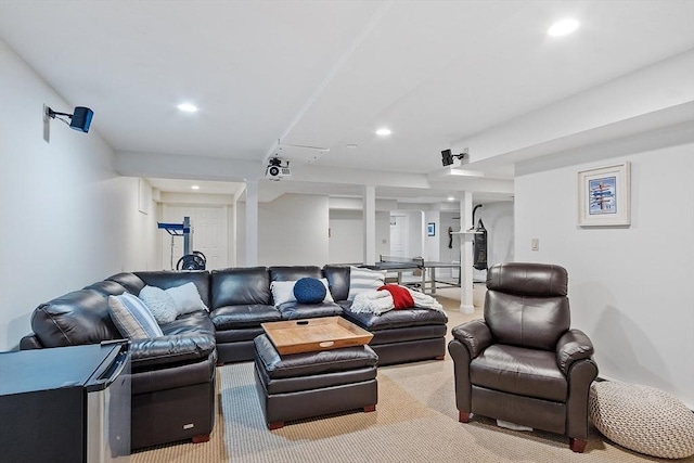 living room with recessed lighting and light colored carpet