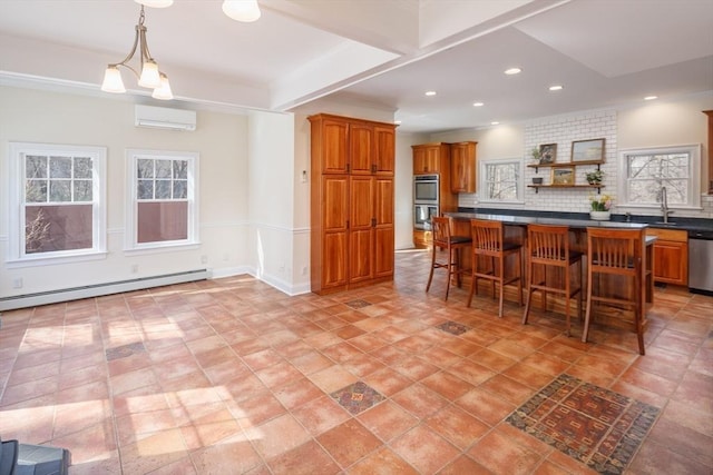 kitchen featuring dark countertops, a baseboard heating unit, brown cabinets, a wall mounted AC, and open shelves