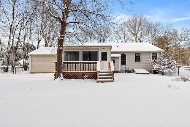 view of snow covered house