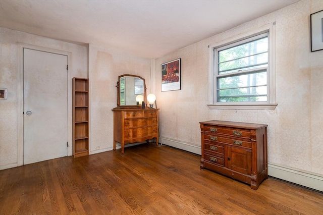 397 Elm St, Braintree, MA 02184 - bedroom featuring wood finished floors and baseboard heating