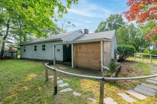 397 Elm St, Braintree, MA 02184 - back of house featuring a chimney and a shingled roof