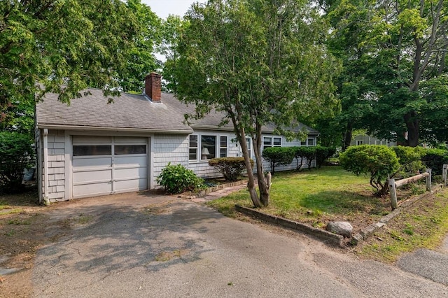 397 Elm St, Braintree, MA 02184 - view of front of property featuring driveway, a chimney, a garage, a front lawn, and roof with shingles