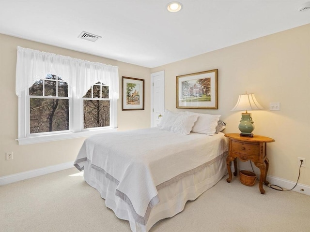 bedroom with light carpet, baseboards, and recessed lighting