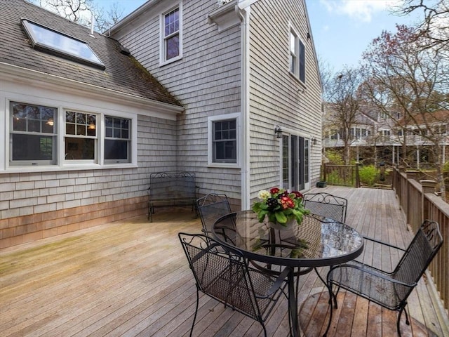deck featuring outdoor dining space