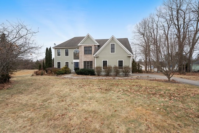 view of front of home featuring a front lawn