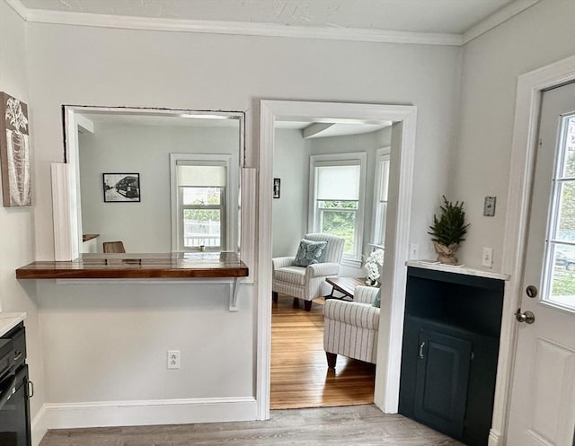 1 S Ave Unit 1, Hull, MA 02045 - entrance foyer with light wood-style floors and crown molding