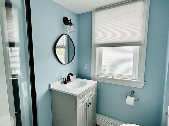 1 S Ave Unit 1, Hull, MA 02045 - bathroom with a baseboard heating unit and vanity