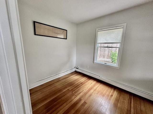 1 S Ave Unit 1, Hull, MA 02045 - unfurnished room with baseboard heating and dark wood-style flooring