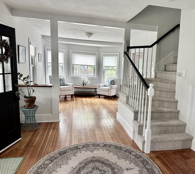 1 S Ave Unit 1, Hull, MA 02045 - foyer featuring hardwood / wood-style flooring and stairway