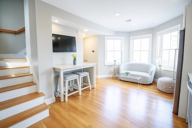 89 Prescott St Unit C, Boston, MA 02128 - living area with plenty of natural light, light wood finished floors, stairs, and recessed lighting