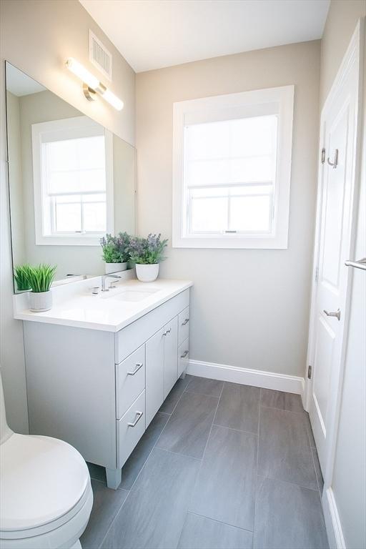 89 Prescott St Unit C, Boston, MA 02128 - bathroom featuring vanity and plenty of natural light