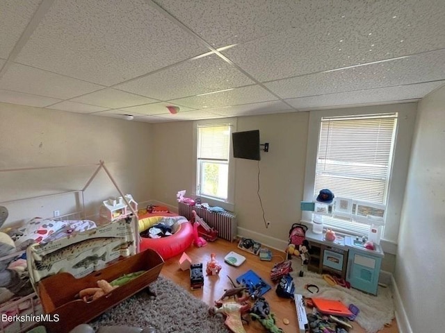 56-58 N Summer St, Adams, MA 01220 - bedroom with radiator, baseboards, a paneled ceiling, and wood finished floors