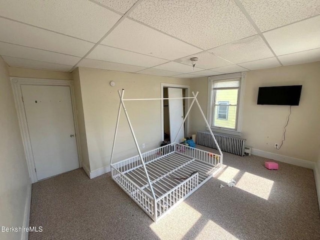 56-58 N Summer St, Adams, MA 01220 - unfurnished bedroom with radiator heating unit, a drop ceiling, carpet flooring, baseboards, and a closet