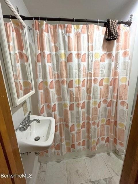 56-58 N Summer St, Adams, MA 01220 - bathroom with marble look tiles and a sink