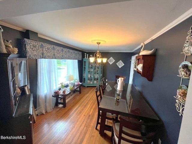 56-58 N Summer St, Adams, MA 01220 - dining space with a chandelier, ornamental molding, and wood finished floors