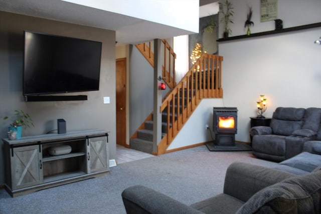 living room with light colored carpet and a wood stove