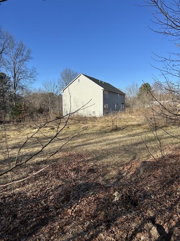 view of outdoor structure featuring an outbuilding