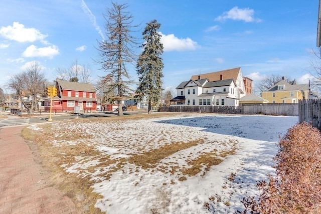 view of yard covered in snow