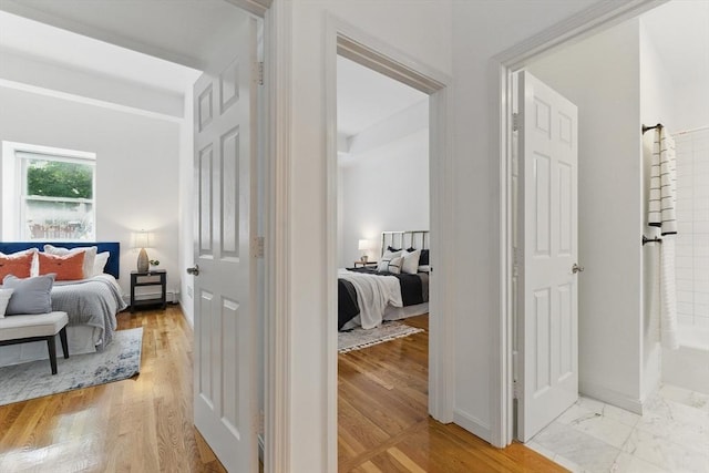 69 Harvey St Unit 1, Cambridge, MA 02140 - bedroom with light wood-style floors