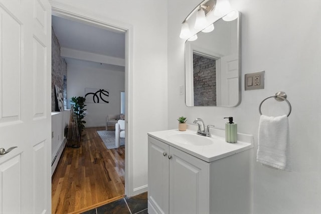 69 Harvey St Unit 1, Cambridge, MA 02140 - bathroom featuring vanity and a baseboard radiator