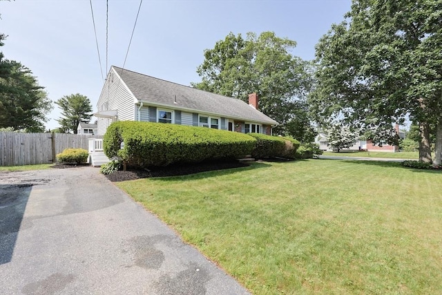 68 Partridge Dr, Brockton, MA 02301 - view of front of property featuring a chimney and driveway