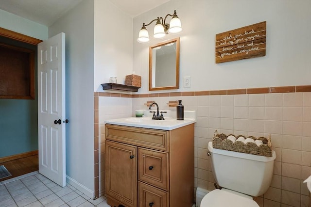 68 Partridge Dr, Brockton, MA 02301 - half bath with vanity, tile walls, tile patterned flooring, and wainscoting