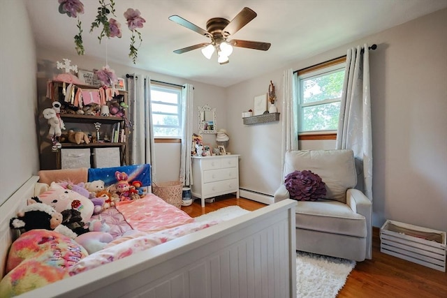 68 Partridge Dr, Brockton, MA 02301 - bedroom with wood finished floors, baseboard heating, and ceiling fan