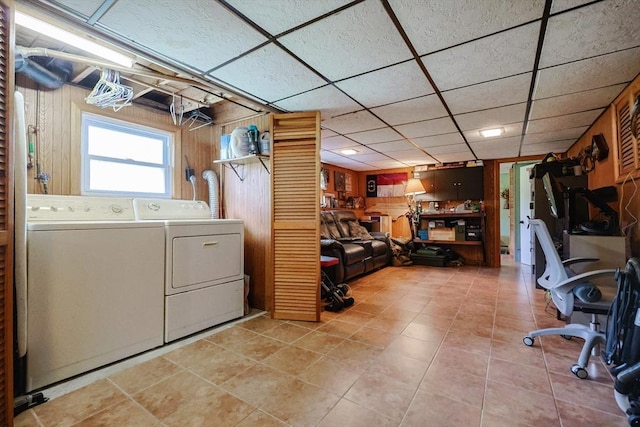 68 Partridge Dr, Brockton, MA 02301 - washroom with washing machine and clothes dryer, wooden walls, and light tile patterned flooring