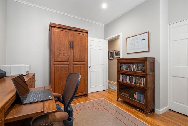 home office featuring recessed lighting, baseboards, ornamental molding, and light wood-type flooring