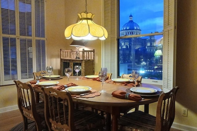 dining room featuring baseboards