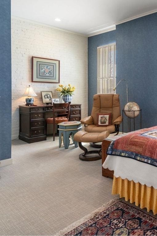 bedroom featuring crown molding and carpet